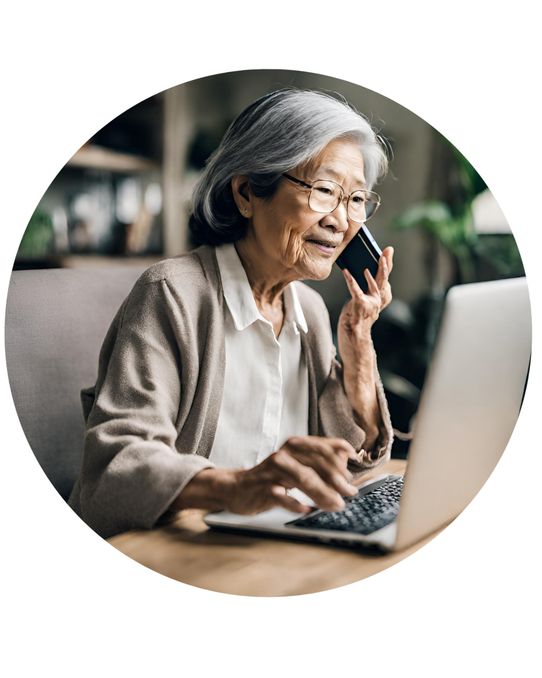 A patient looking at a laptop screen while talking on the phone.